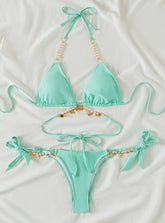 Traje de baño con tiras y colgante de cristal de perla