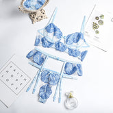 Conjunto de lencería de encaje con bordado de mariposas transparentes