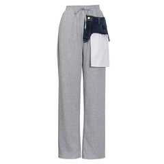 Pantalones deportivos de cintura alta con apliques de mezclilla y bolsillo invertido deconstruido