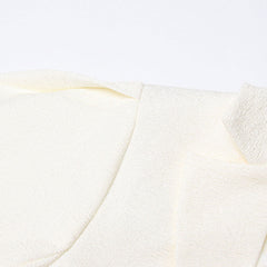 Dekonstruierte Rüschen-Cutout-Seiten-Puffärmel-asymmetrische Peplum-Jacke