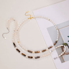 IT IS BAROQUE Süßwasserperlen Tigerauge Smile Choker Halskette