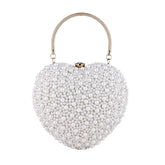 Bolso de mano con asa de metal y cuentas de perlas en forma de corazón - Blanco