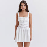 Minivestido sexy de verano con fruncido, lazo frontal, escote cuadrado, tirantes y ribete de encaje