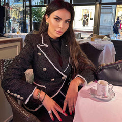 Zweireihiger Blazer aus glänzendem Lurex-Tweed mit kontrastierendem steigendem Revers – Schwarz