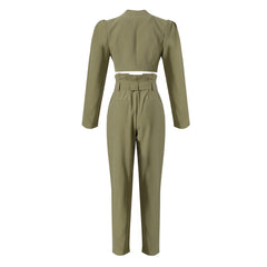 Pantalones elegantes de cintura alta, plisados y con cinturón de color liso