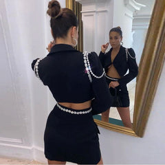 Blazer corto con mangas abullonadas y adornos de cristales brillantes. Conjunto a juego - Negro.