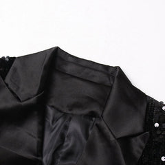 Blazer largo cruzado con puños de plumas y adornos de lentejuelas brillantes - Negro