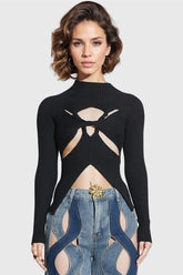 Suéter negro con aberturas y canalé