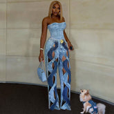 Vaqueros vintage con corte en espiral, cintura alta, pierna ancha y estampado floral dorado