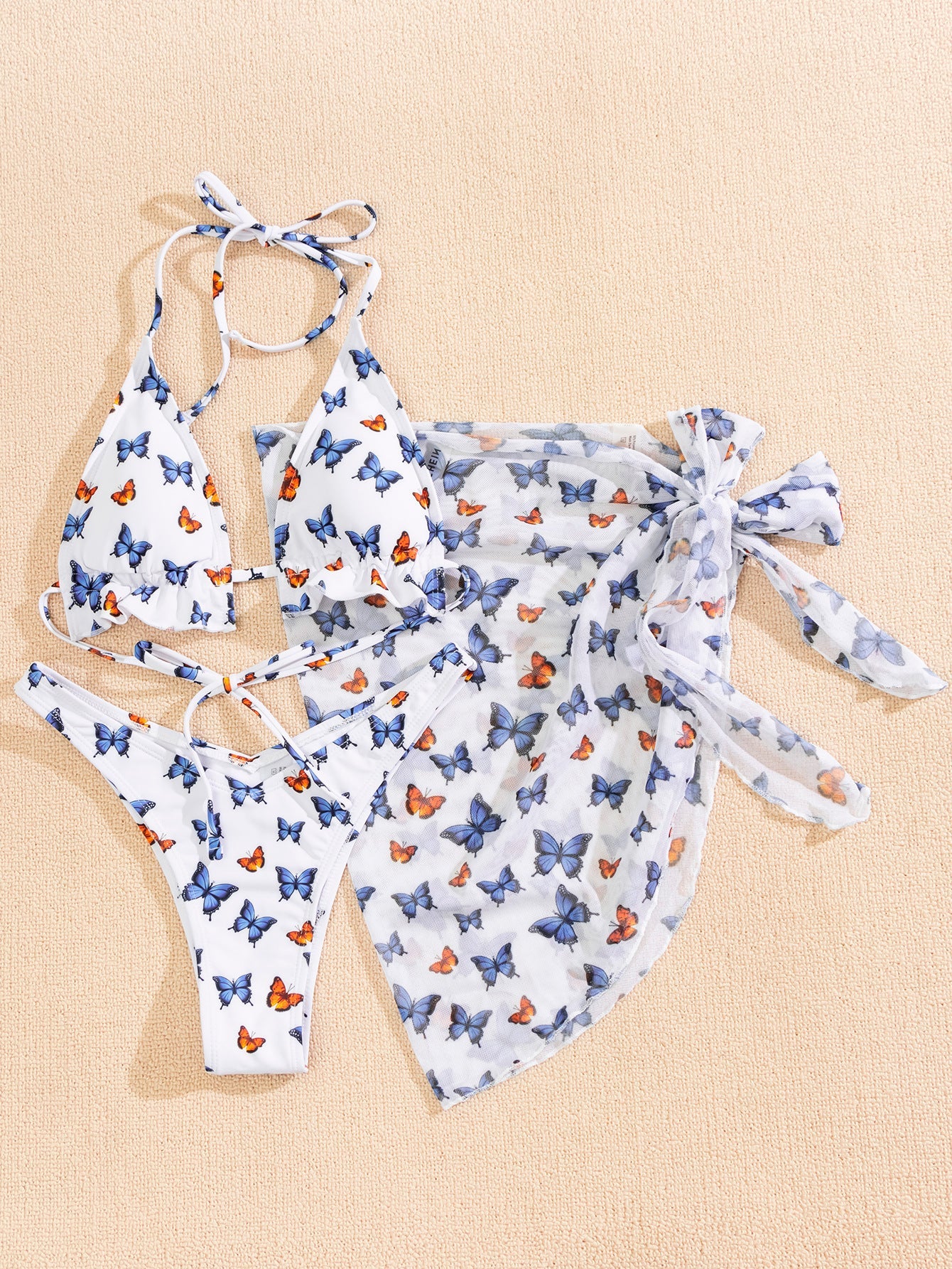 Dreiteiliger Bikini mit Gazerock und Schmetterlings-Print