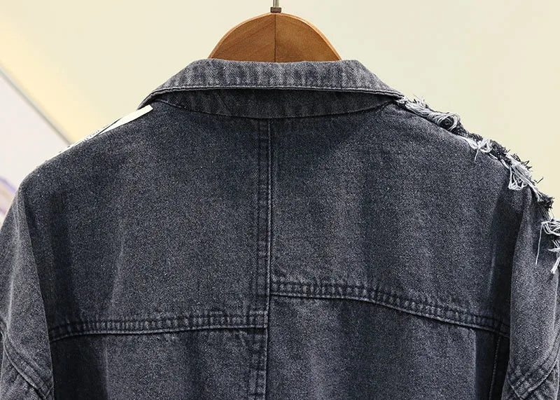 Chaqueta vaquera vintage de patchwork: diseño gráfico de moda