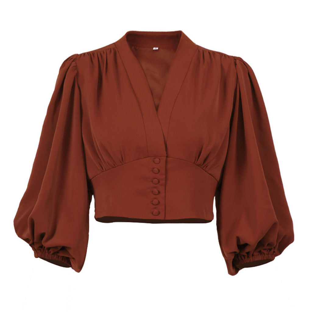 Elegante blusa corta de gasa con cuello en V, botones y mangas farol fruncidas de color liso