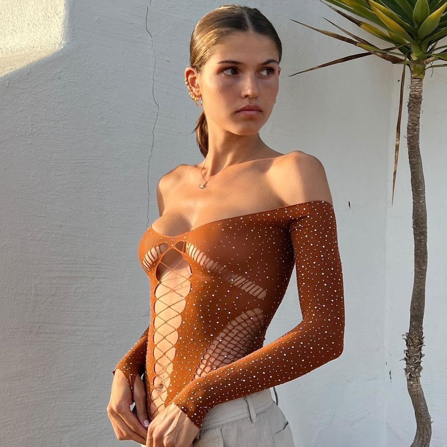 JUIN Glitzernder Mesh-Bodysuit mit Cut-Outs