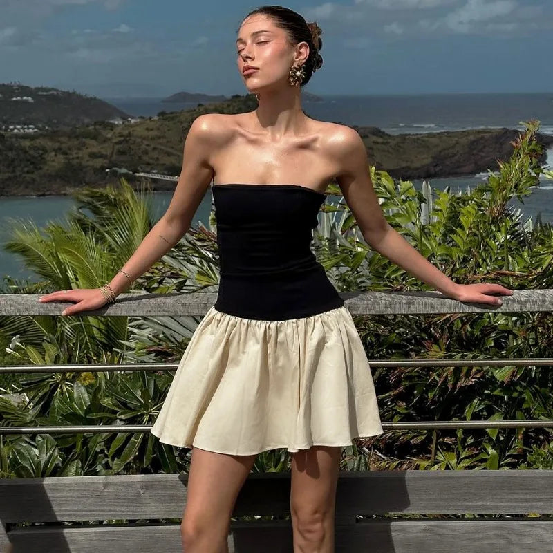 MINI VESTIDO CON FALDA BLANCA Y TOP NEGRO