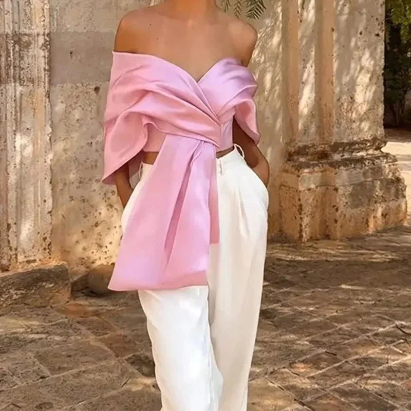 Top corto plisado con lazo de satén rosa chic