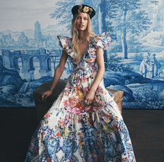 Vestido largo con vuelo y cuentas florales