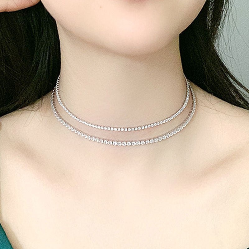 Iced Out Tenniskette aus Sterlingsilber mit rundem Zirkonia-Schliff