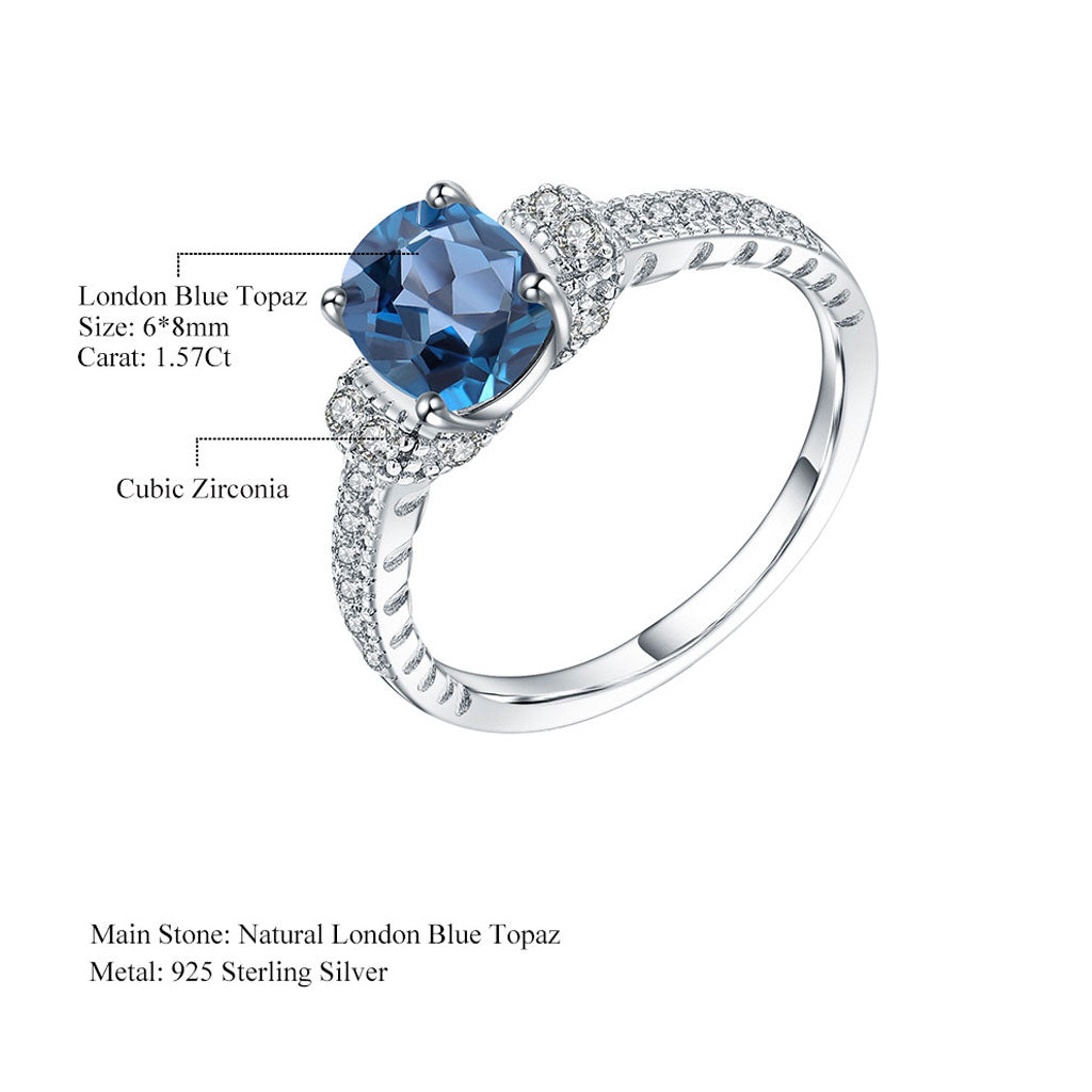 Opulenter Halo-Ring mit klarem London-Blautopas und Zirkonia