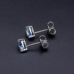 Opulent Pear Shaped Halo Swiss Blue Topaz Stud Earrings