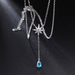 Collar con colgante de corazón de topacio azul y estrella de circonita cúbica de cristal brillante