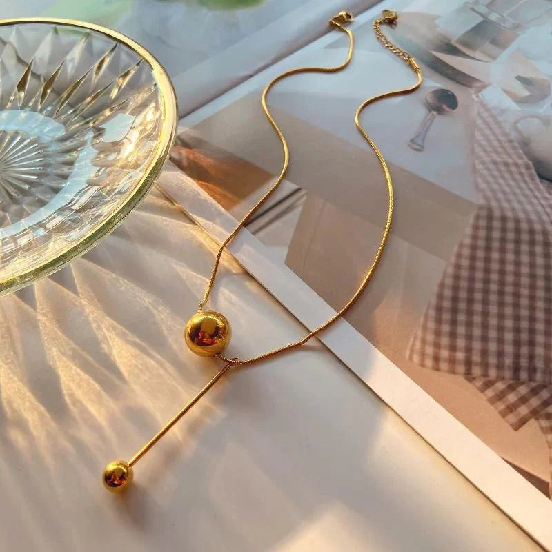 Halskette mit Quaste aus Edelstahl – geometrischer Kugelanhänger, Schlüsselbeinkette, Schmuck 