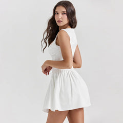 Vestido mini de encaje patchwork con tirantes finos para primavera/verano 2024.